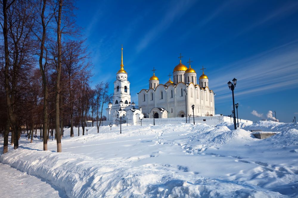 Russian church on top of a snow-covered hill
