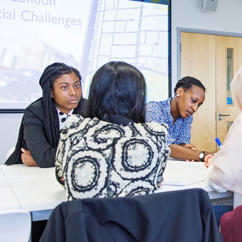 Students sat at table and working