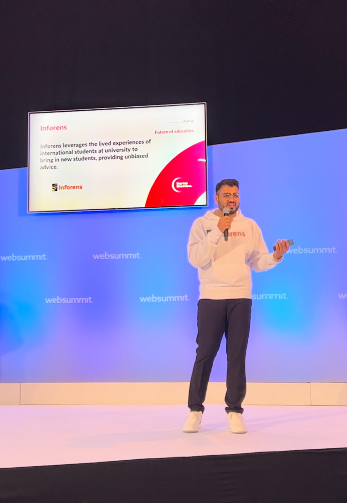 A young man presenting to an audience