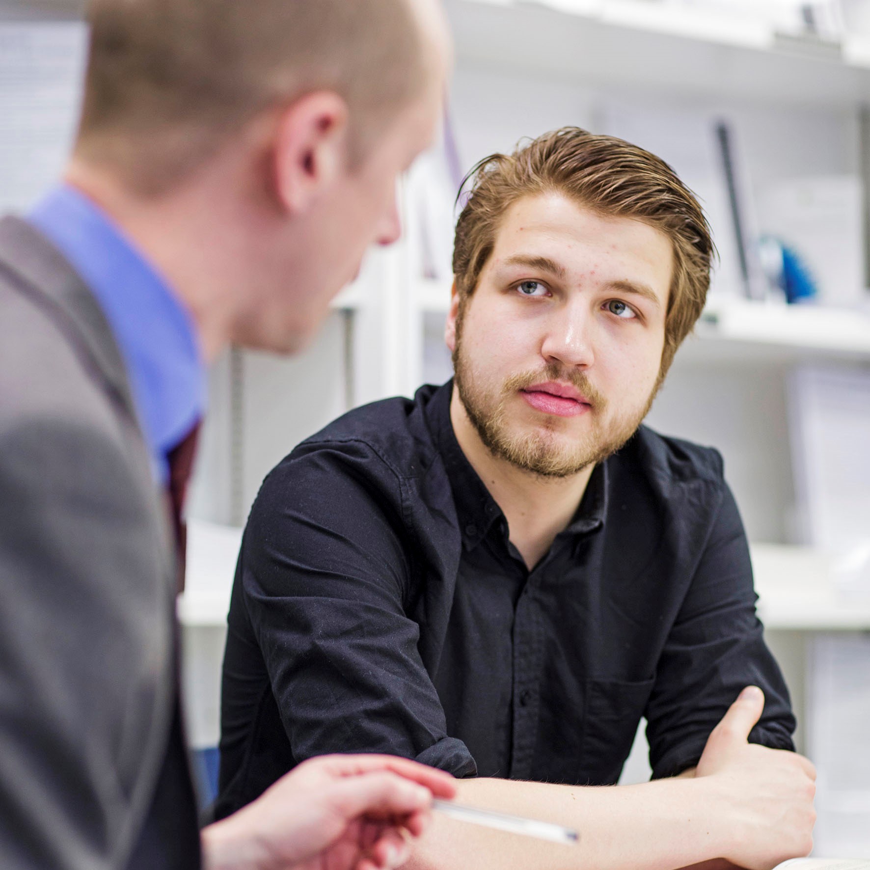 Careers consultant talking to a student