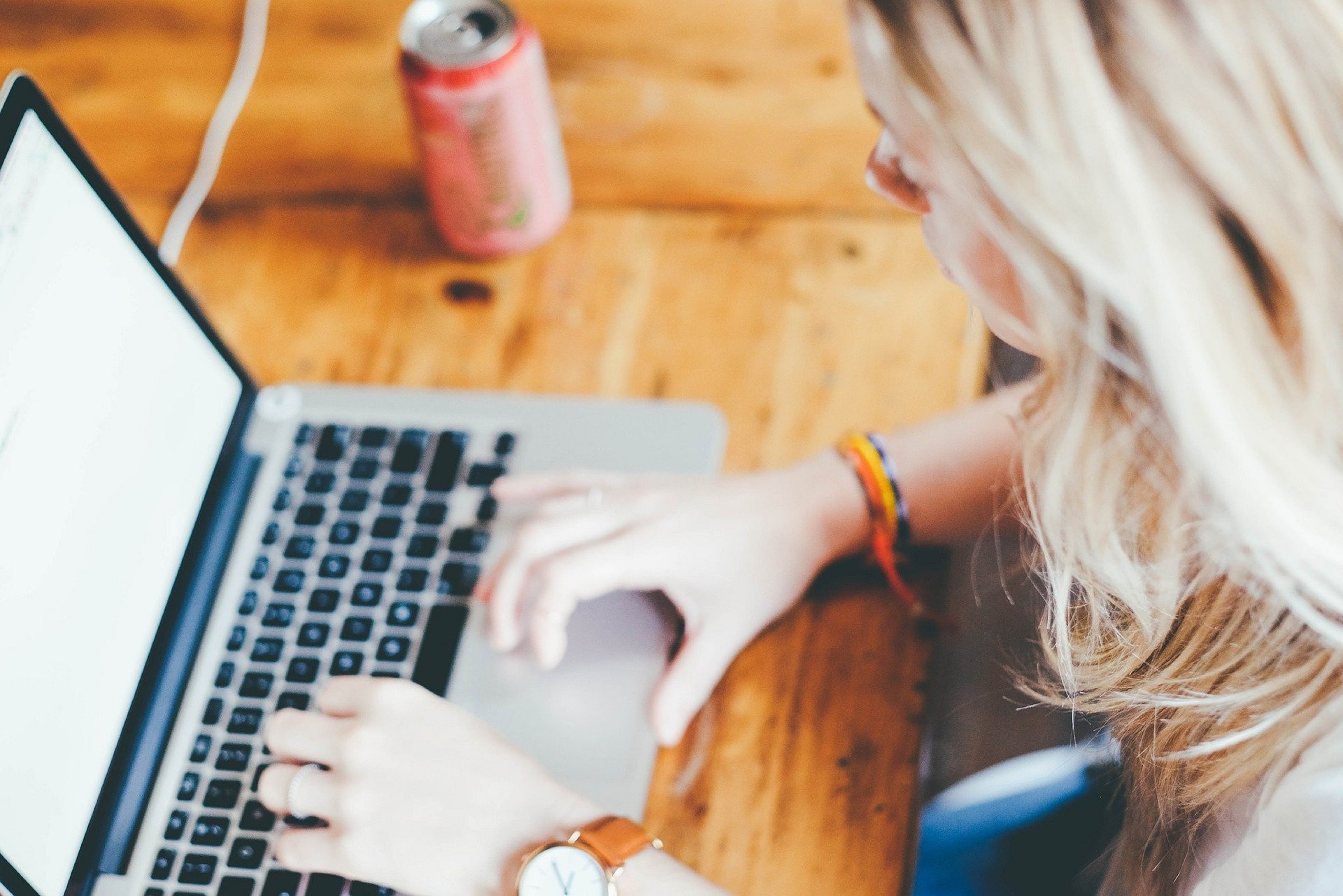 Woman typing on a computer