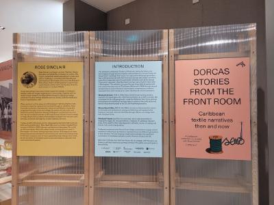 Information boards about the Dorcas Stories: Front the Front Room. There is an introduction to the exhibition and the artist Rose Sinclair.