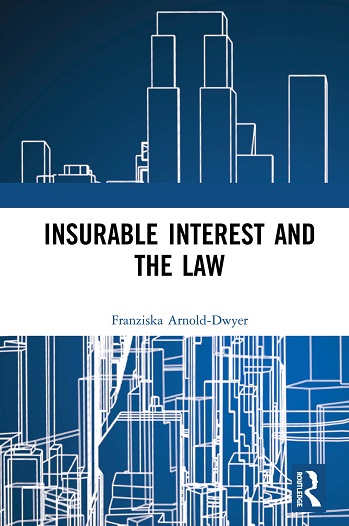 Book cover in blue with skyscrapers outlined in white