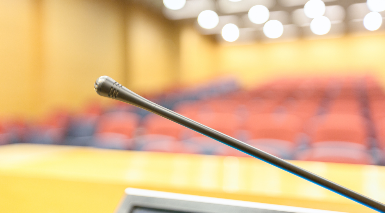 Microphone positioned on a lectern