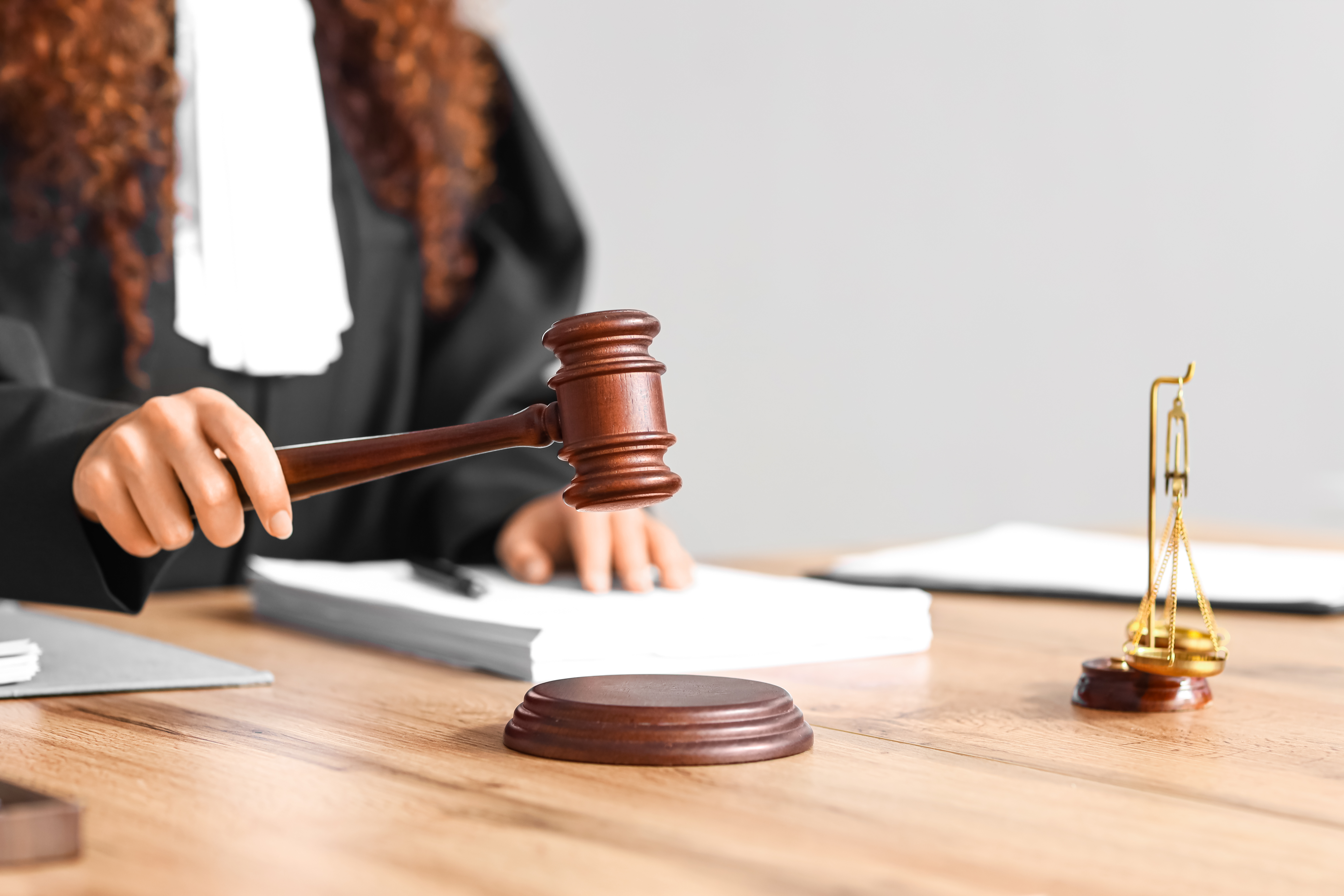 Female judge at desk with gavel