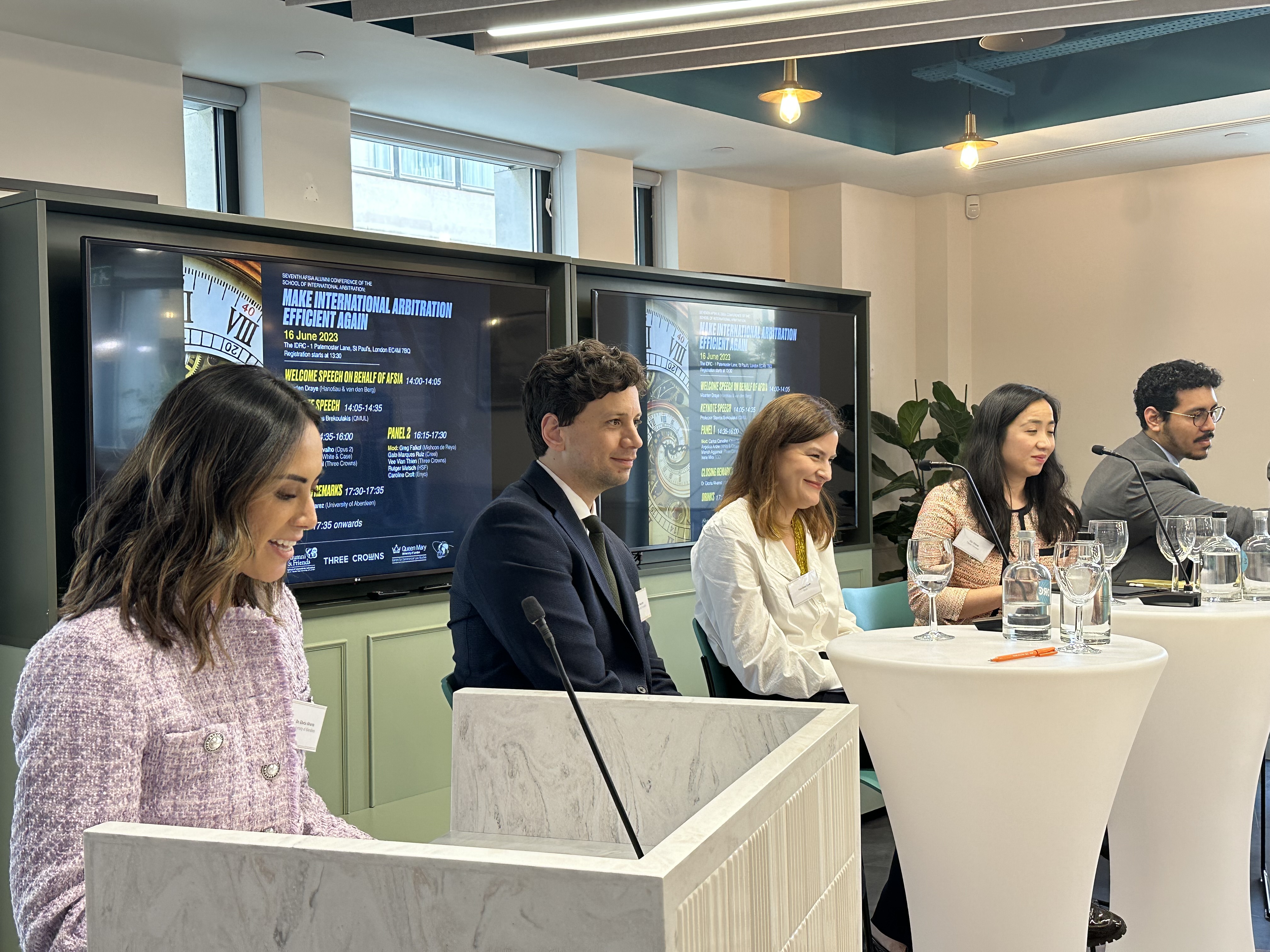 Panel of speakers talking at AFSIA Conference