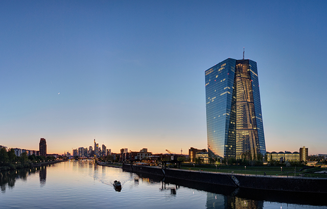 European Central Bank building at dusk.