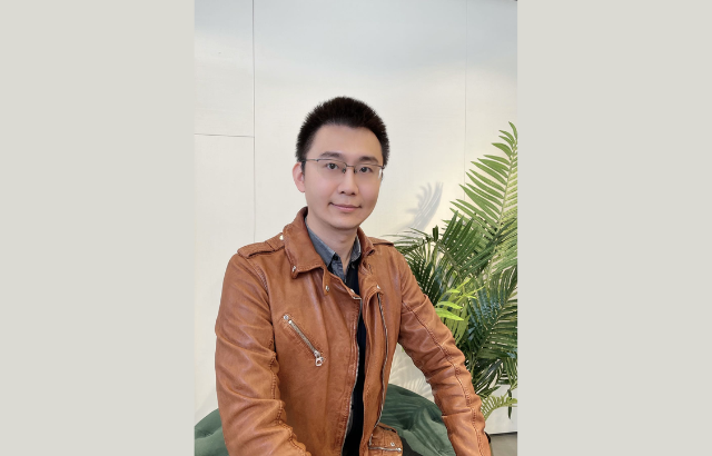 Dr. Yuanwei Liu facing the camera