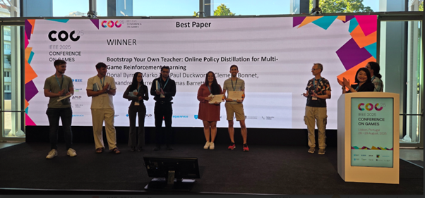 A group of academics looking at the camera