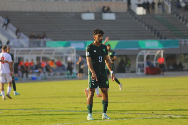 Imran Kayani on a football field