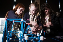 3 pupils working on an engineering project