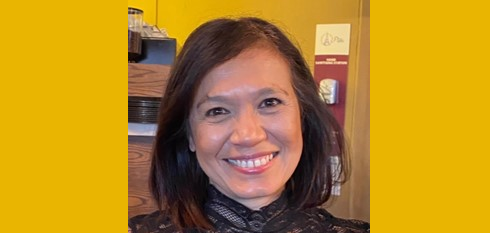 A picture of Dr Jasmine Murphy against a yellow background