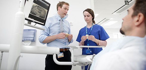 Doctor and nurse with patient 