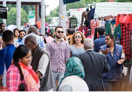 A picture of a diverse group of people in the local community