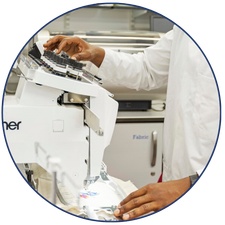 Photo of hands using a machine for research