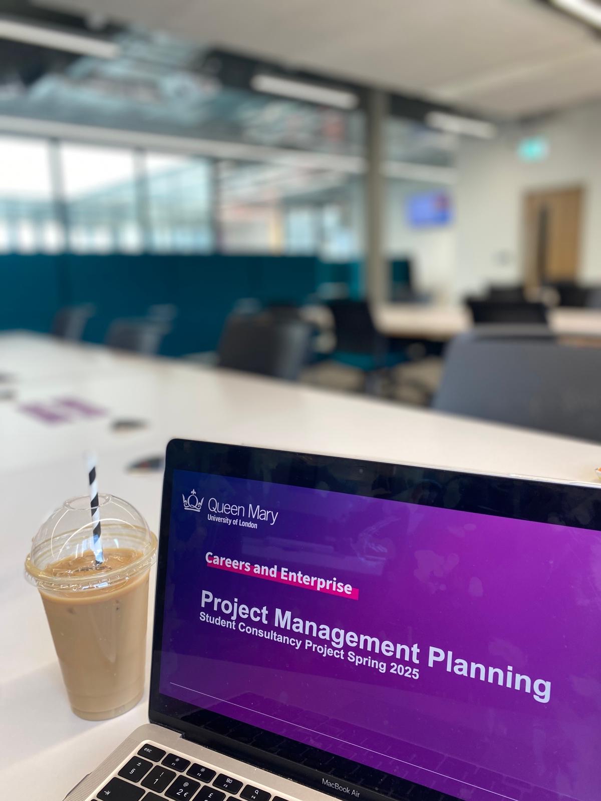 laptop screen and coffee