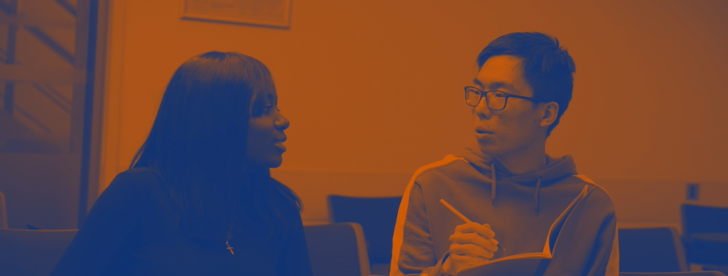 Two students talking to each other