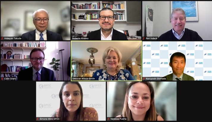 The panel for this event smile at the camera