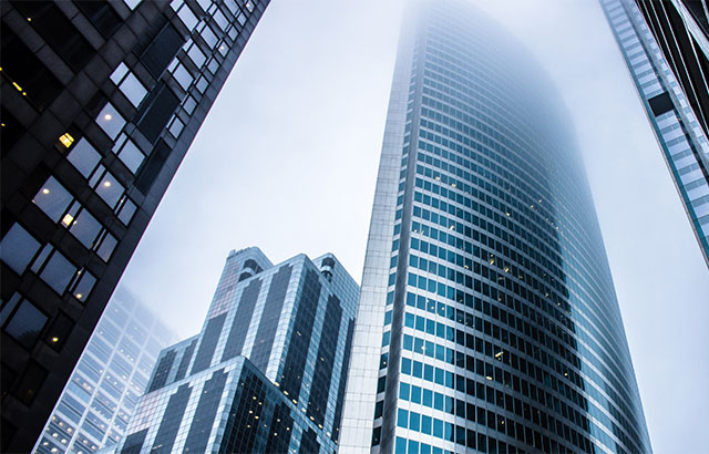 3 buildings with a grey-ish tone.