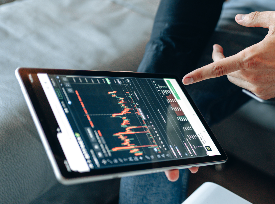 Stocks and shares graph on iPad screen