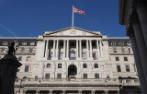 Front of the Bank of England with the Union Jack flying above it.