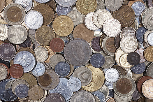 A bunch of coins of various currencies