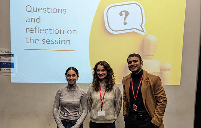 Three Queen Mary Legal Advice Centre students presenting at a SPITE workshop.