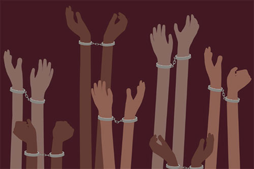 Pairs of hands in handcuffs reaching out