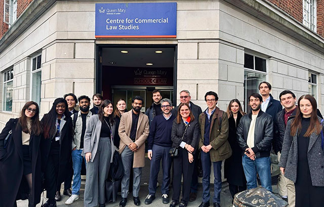 Rosa Lastra and Daniele D'Alvia standing outside CCLS with Chris Bates and LLM students.