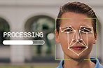 A man with dots over his face with a processing bar the left of him.