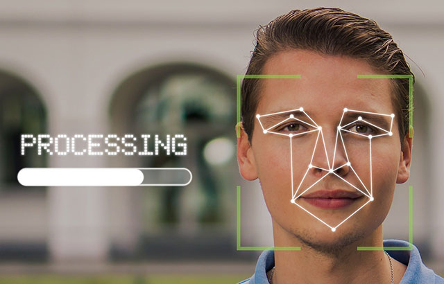 A man with dots over his face with a processing bar the left of him.