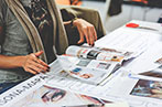 A woman reading a magazine