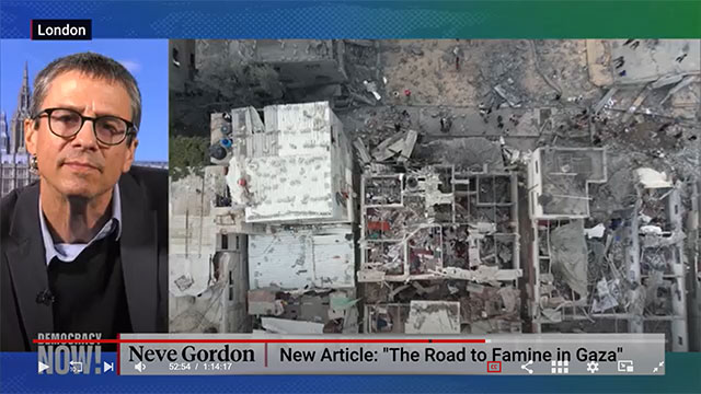 Professor Neve Gordon speaking on Democracy Now! Next to his image is an aerial photo of bombed buildings in Gaza.