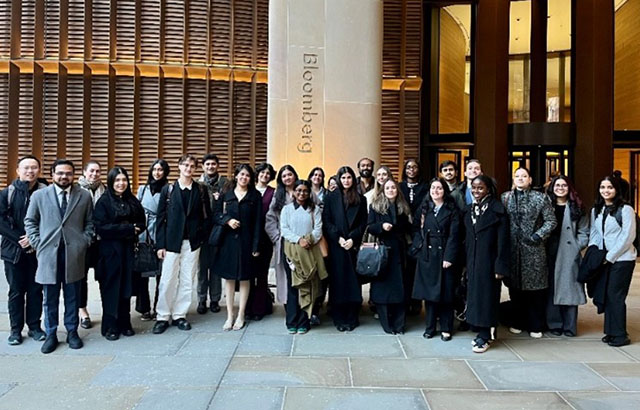 Queen Mary qLegal students taking a group photo outside of the Bloomberg offices.