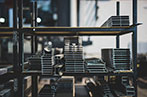 Some steel on a shelf in a warehouse.
