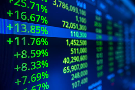 Series of financial figures on an electronic board