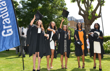 Students at a graduation ceremony on Queen Mary campus
