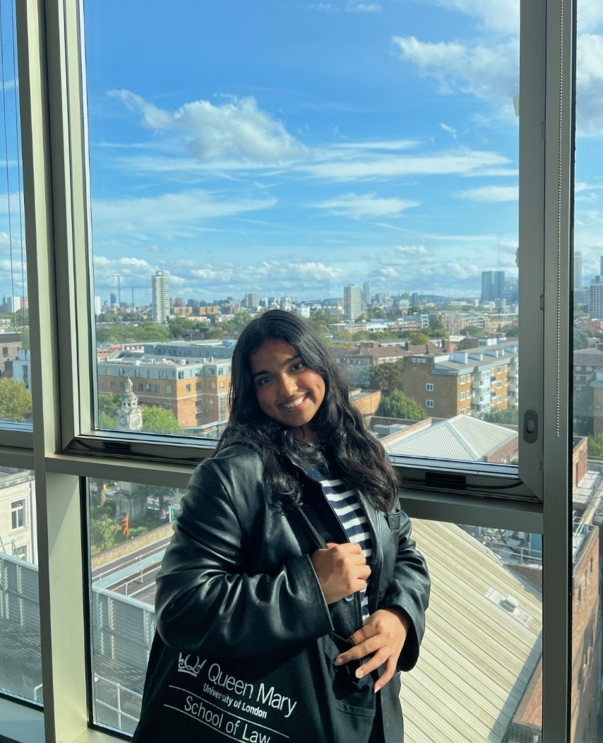 Vandy at the Graduate Centre with London skyline in the background
