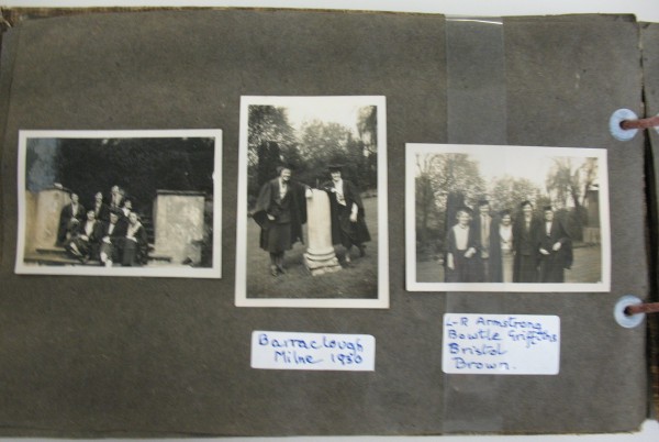 Photograph of a page from a photo album with three black and white photographs of women in various groupings, wearing academic caps and gowns