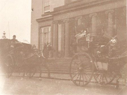 Black and white photograph of horse drawn carriages at Westfield College in 1905