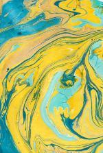 Example of marbled paper with swirls of colour in yellow, orange and turquoise
