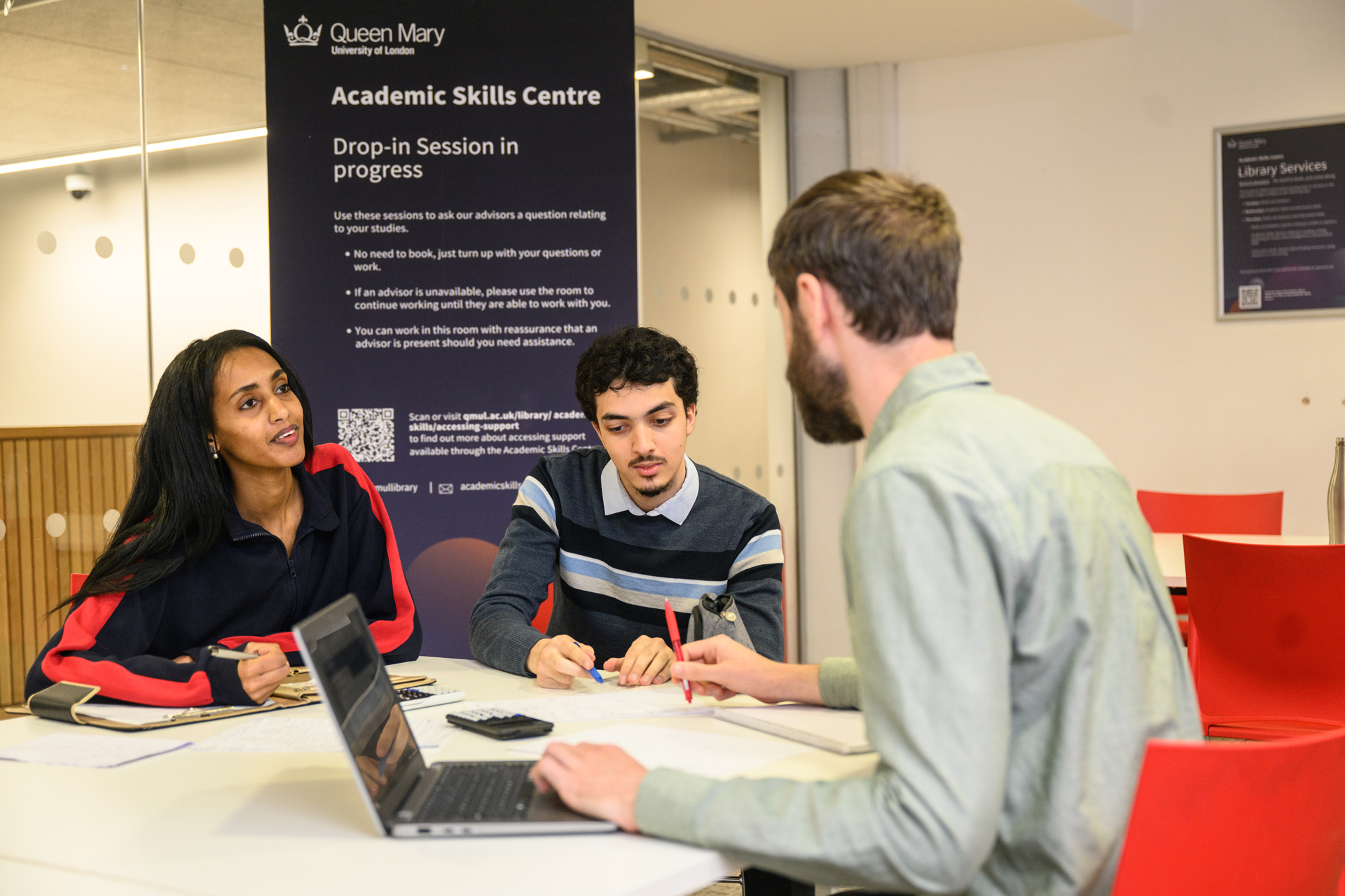 An Academic Skills Tutor helping 2 students with their studies