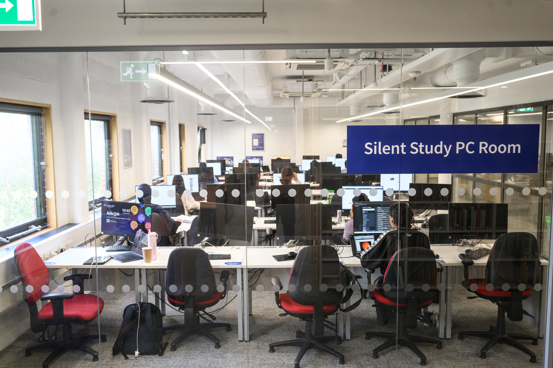 Rows of desks with PCs