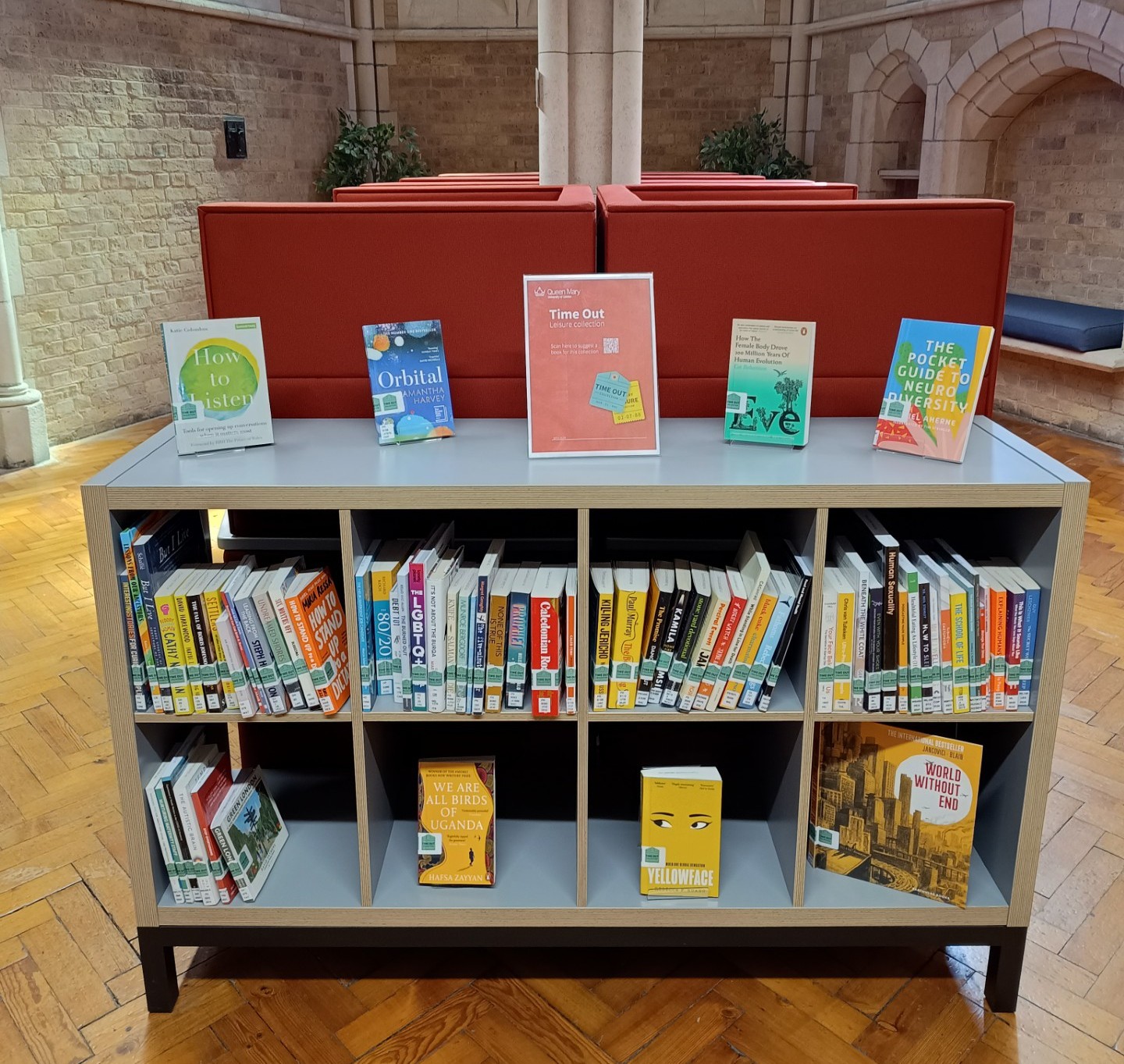 low height shelving unit containing selection of books