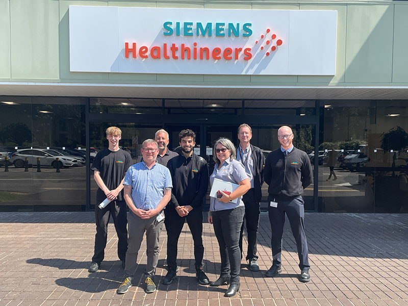 Hossein and his team outside Siemens Healthineers