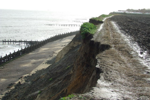 'Toxic waste is spilling onto beaches as rising seas erode landfills'