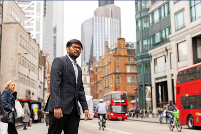 Student walking through the city of London