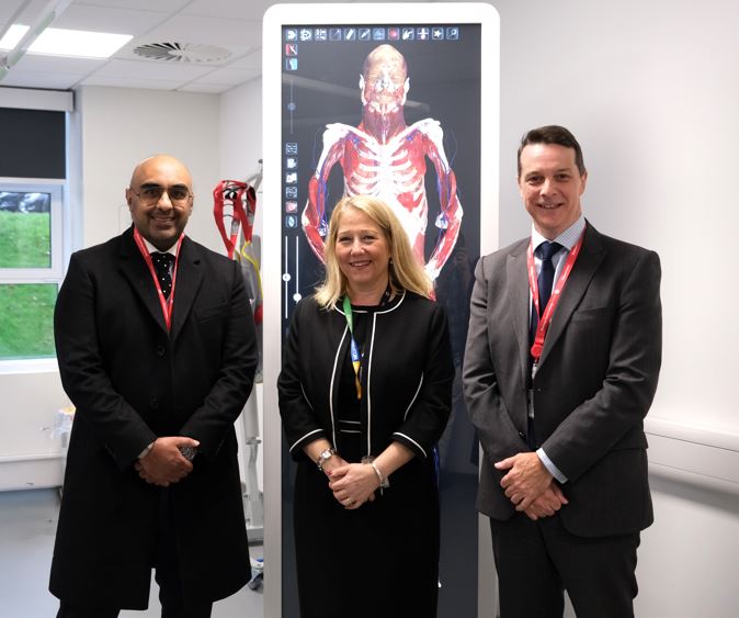 standing next to skeleton? thing