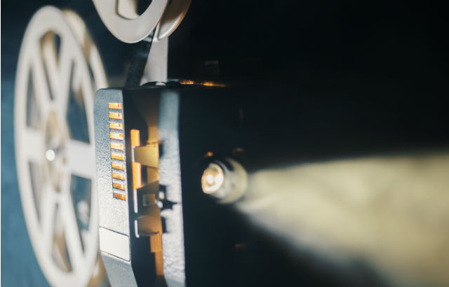 A photograph of a cinema projector