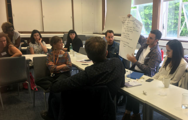 Photograph: Academics working during the interdisciplinary workshop at Queen Mary